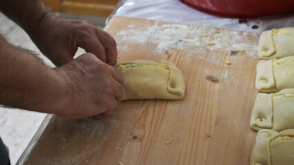 Traditional Cypriot Flaouna, a delicious Greek Easter Cheese Bread. Flaounes are traditionally prepared for Easter by Orthodox Cypriots.