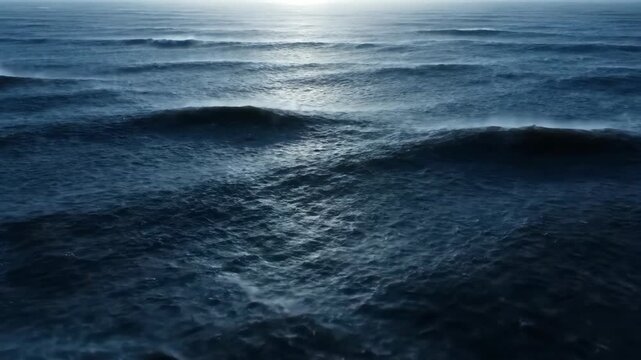 Stormy ocean view with dark waves and horizon; seascape