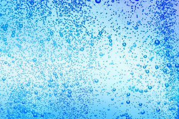 Many bubbles, view through clear glass. Closeup