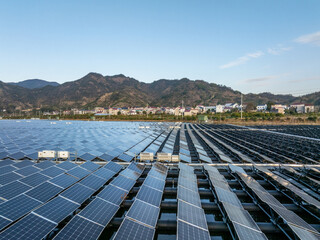Floating solar farm by mountain lake