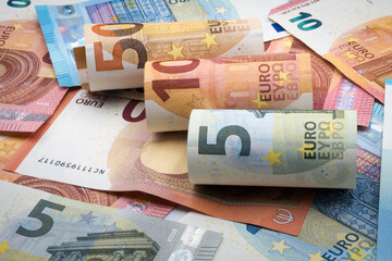 Euro banknotes in denominations of five, ten, twenty and fifty.
