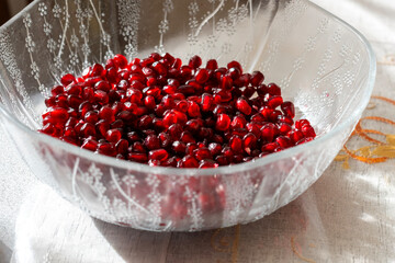 Fresh Pomegranate Seeds in Glass Bowl