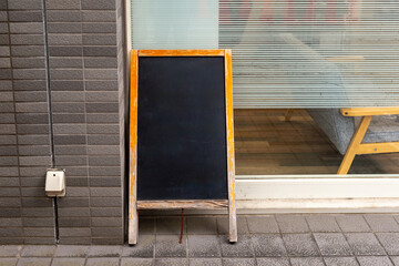 Large blank billboard on a street wall, banners with room to add your own text