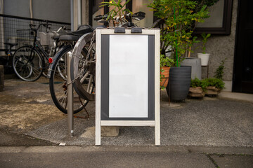 Large blank billboard on a street wall, banners with room to add your own text