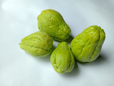 fresh green chayote Sechium edulis also known as mirliton or choko isolated white background. 