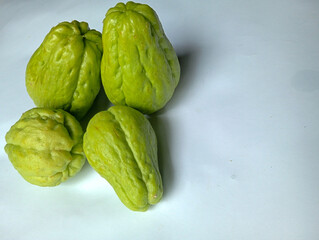 fresh green chayote secium edule also called labu siam or mirliton or choko. 