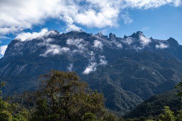 Fototapeta premium Mt.Kinabalu the highest mountains in Malaysia seen from Kinabalu Park located on the west coast of Sabah, Malaysian Borneo.