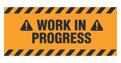 A bright orange and black warning sign clearly indicates a work in progress area with caution