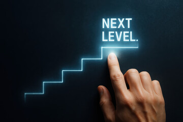 Next level staircase hologram hand touch glowing step metaphor for progress and ambition a human hand reaching to touch an illuminated NEXT LEVEL prompt inspiring drive
