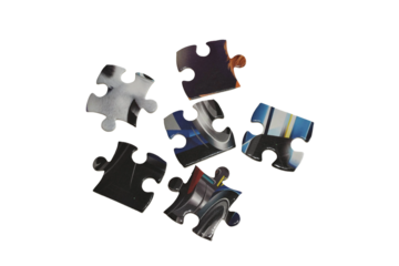 Individual puzzles are randomly isolated on a white background.
