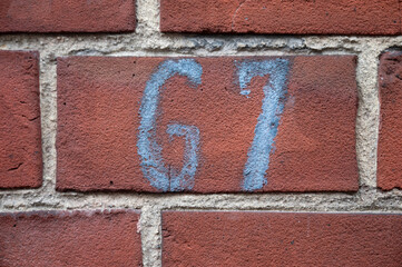 House number 67 with playful pop culture reference