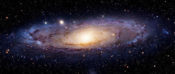 Obraz premium Andromeda Galaxy's Cosmic Dance: Witness the awe-inspiring spiral arms of the Andromeda galaxy, a breathtaking celestial spectacle, shimmering with countless stars and cosmic dust.