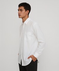 smiling filipino guy on oversized shirt fit model pose on white background