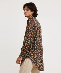 smiling filipino guy on oversized shirt fit model pose on white background