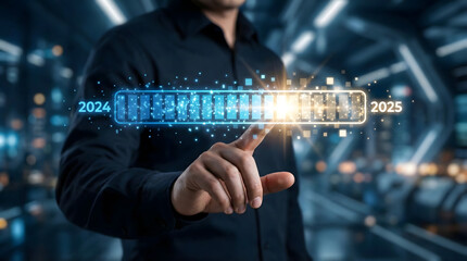 Businessman hand touching virtual loading bar changing from 2024 to 2025,representing corporate strategic planning,future timeline management,and successful business transition.
