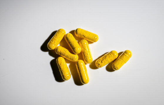Close up of Berberine Supplement Capsule on White Background