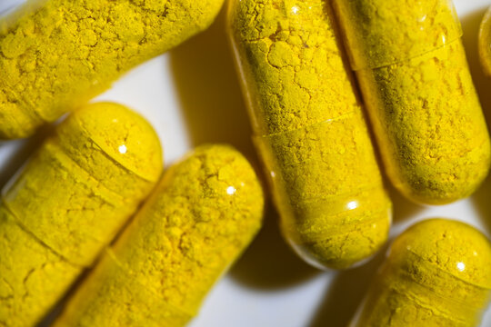 Close up of Berberine Supplement Capsule on White Background