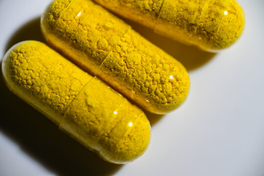 Close up of Berberine Supplement Capsule on White Background