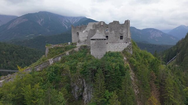 Aerial view of the ruins of Ehrenberg Castle near Highline 179. The castle stands on a peak in the mountains of Tyrol, Austria