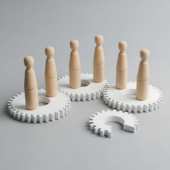 Teamwork and collaboration with gears and wooden figures