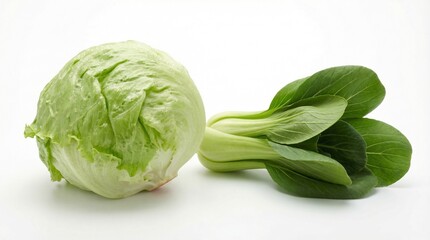 Fresh iceberg lettuce and vibrant bok choy showcasing healthy green vegetables