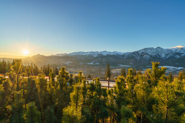 Tatry mountains at sunrise seen from Gubalowka hill in Zakopane. Poland