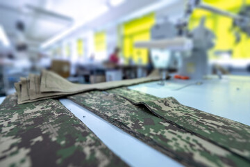 Ready for sewing camouflage fabric parts in factory