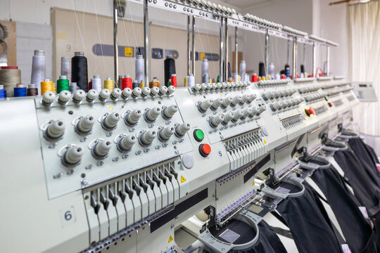 Automated multi head embroidery machine in textile factory