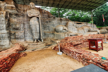 Side view of the Reclining and Standing Buddhas at the Gal Vihara or Rock Monastery,Uttararama, built by the great Sinhalese King Parakrambahu I, 12th century CE at Polonnaruwa, Sri Lanka