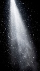 A strong beam of light cuts through a dark area. Tiny particles float in the light, making a visible path. The setting looks mysterious and intense at night, with contrasts of light and shadow