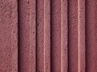 赤い壁の表面が織り成す模様とテクスチャ