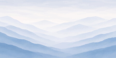 Fototapeta premium Misty mountain landscape with clouds at sunrise over a snowy forest valley where fog and haze meet the morning horizon under a blue winter sky