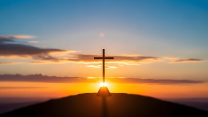 Easter sunrise with cross on hill symbolizing resurrection and hope