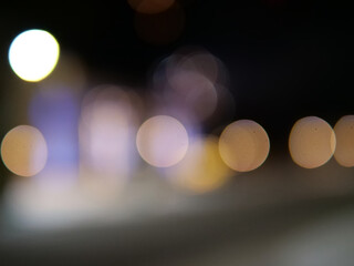 Abstract Night City Bokeh with Warm Glowing Light Orbs on Dark Background