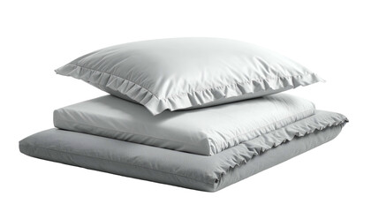Stack of three soft, white bed linens, pillow and coverlet, with decorative edges