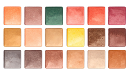 A sixteen-pan eyeshadow palette with a variety of warm and cool colored squares