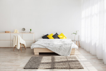 Contemporary home interior, ad, offer and rental of real estate. Double bed with yellow and black...