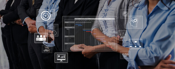 A diverse group of business professionals stands together, showcasing unity in a corporate...