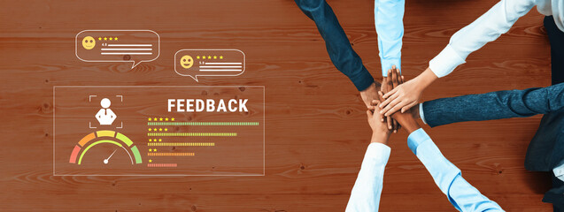 A diverse group of professionals is engaged in a collaborative feedback session, highlighting teamwork, productivity, and communication in a modern office environment. Trope