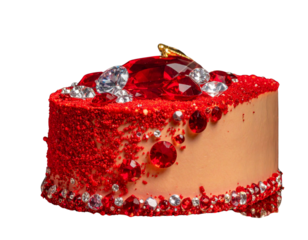 A slice of cake adorned with red gems, diamonds, and rhinestones, creating a luxuriou