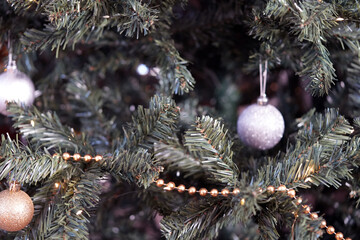 Silver ornaments on Christmas tree