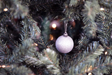 Silver ornaments on Christmas tree