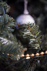 Silver ornaments on Christmas tree