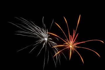 Colorful explosive celebration unfolds, Vivid fireworks light up evening sky