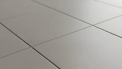 Close-up of clean white square tiles with gray grout lines