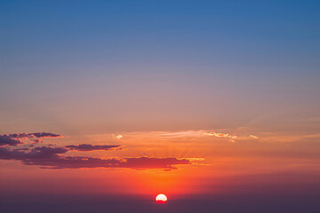 Sunset with sun and clouds nature