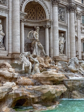 Trevi fountain rome italy baroque architecture marble statues of oceanus with horses and tritons in water outdoor landmark concept of tourism, italian heritage, history