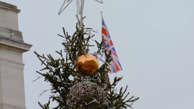 Union Jack British Flag, Waterloo Place Christmas Tree Topper, Star Of Bethlehem, St James's Festive Decorations, Central London, England, United Kingdom, Britain