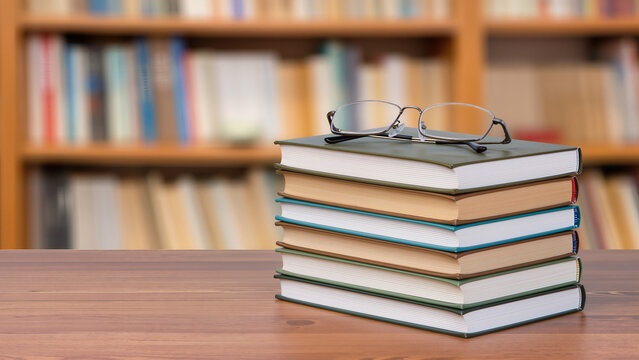 Elegant petit four pastries on marble platter, flat lay.