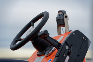 Sylt steering wheel and orange black plastic control device